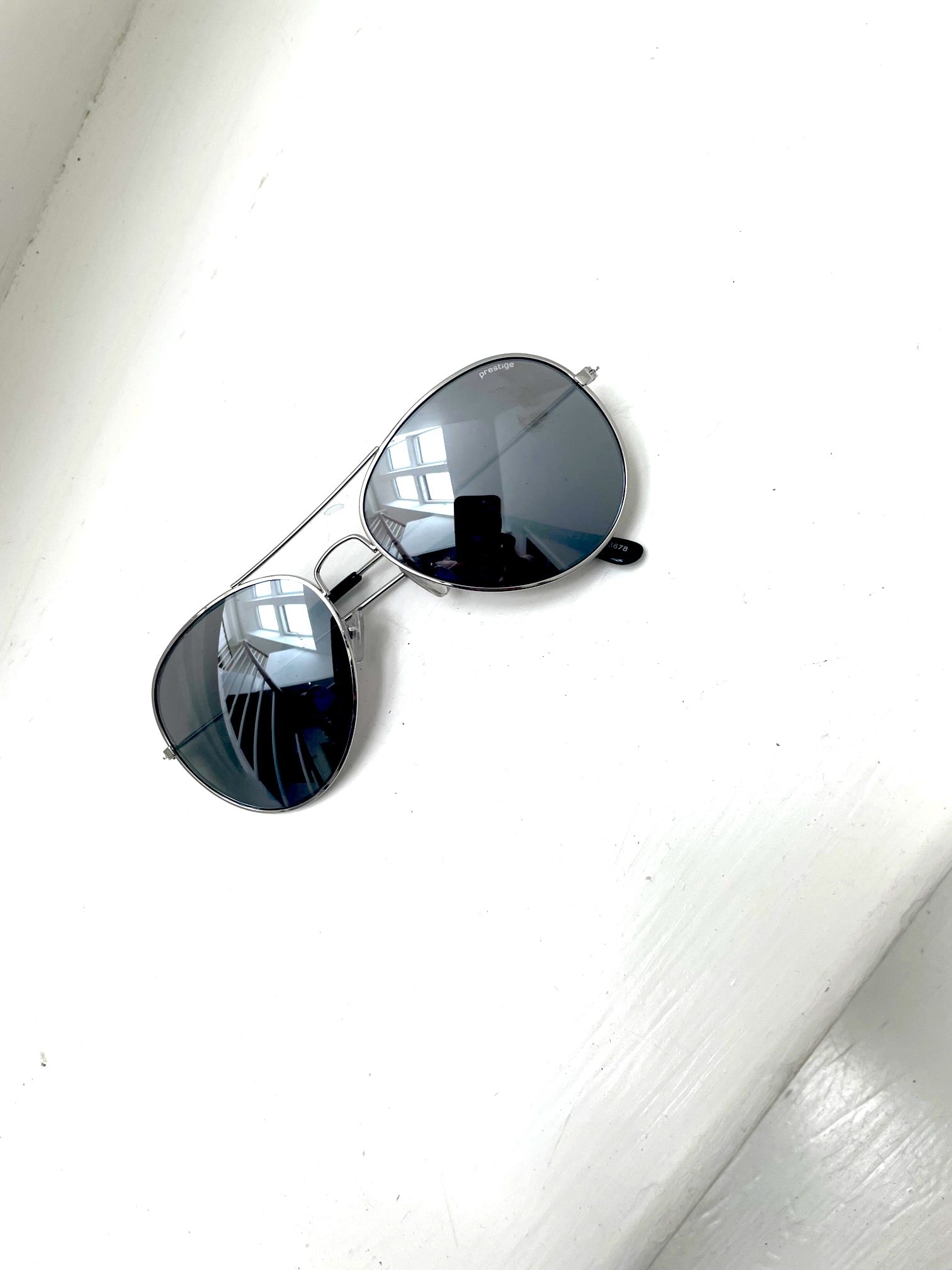 Palads spand Indeholde Prestige solbriller med sølv spejleffekt – Fashionistas